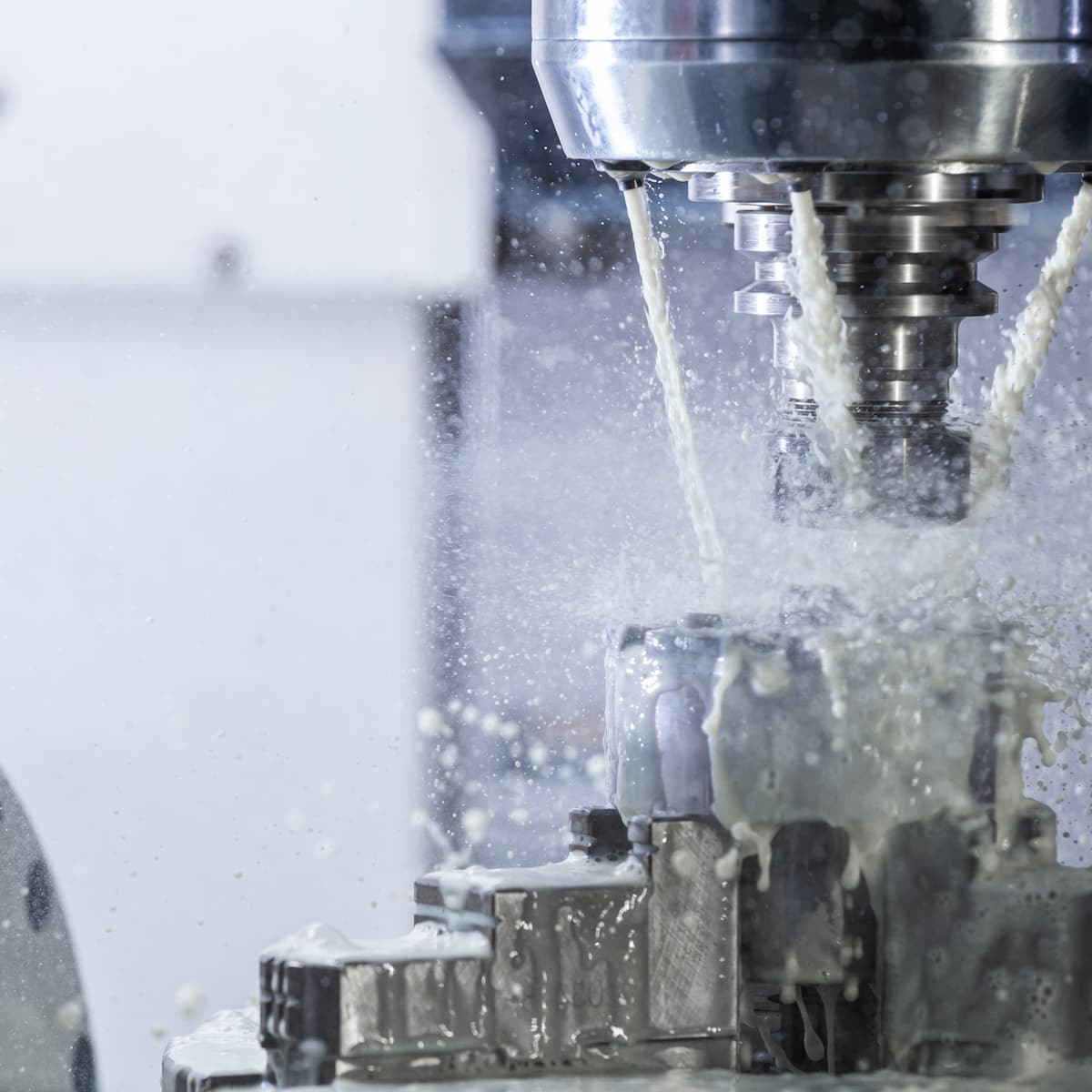 CNC milling machine in operation with metal cutting process